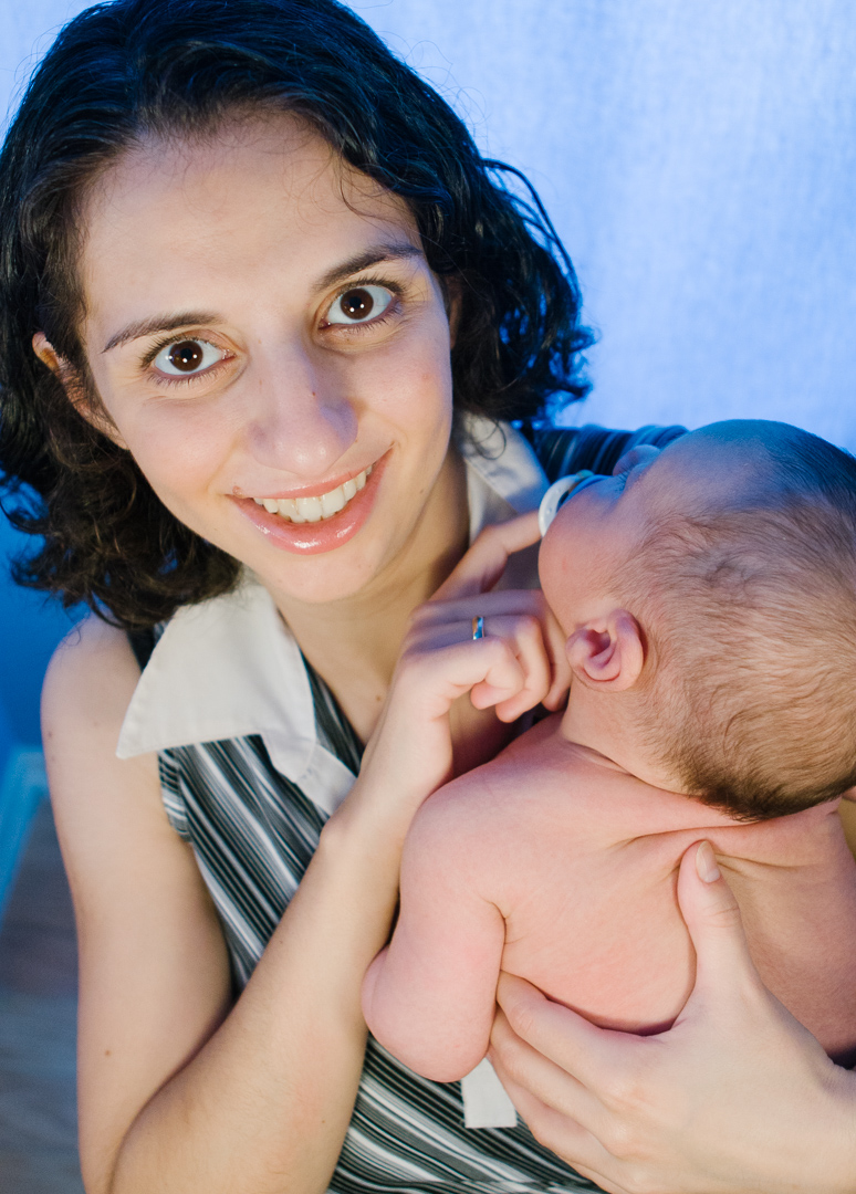 Happy, ecstatic new mother with her newborn child