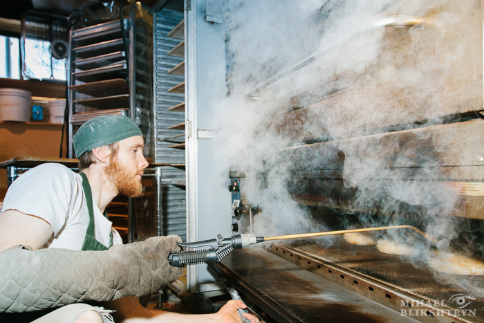 Shaping dough at a commercial artisinal bakery for baking