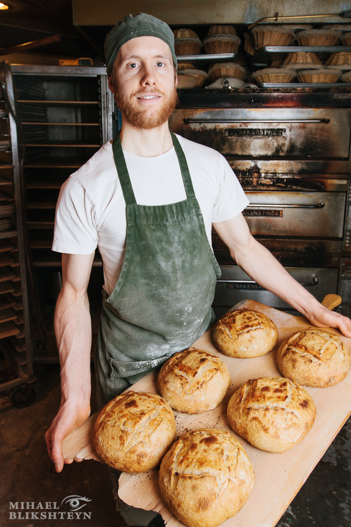 Shaping dough at a commercial artisinal bakery for baking